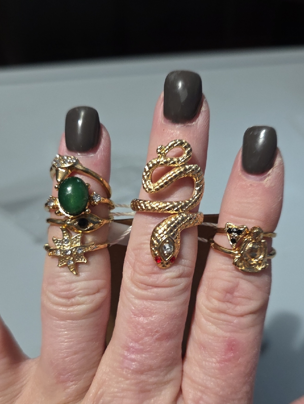 Gold Snake Wrap Ring with Green and Clear Accents